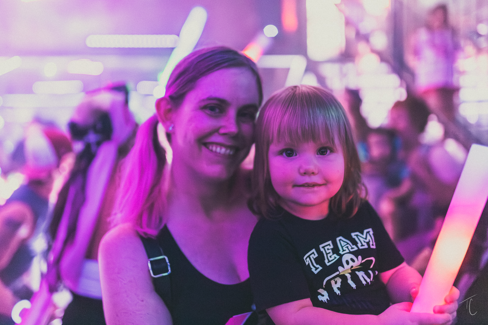 Mom and daughter with glow sticks