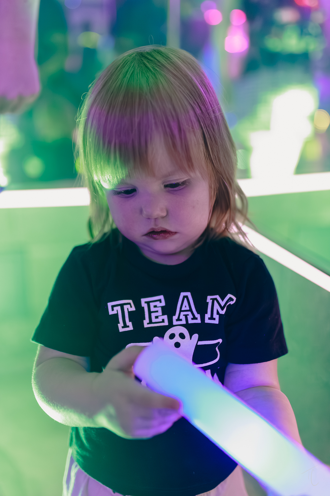 Young child with glow stick